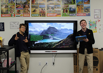 student presentation in front of television